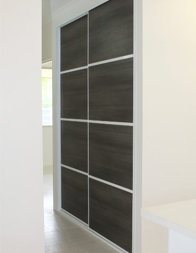 Hallway Cupboard Sliding Doors situated near the kitchen